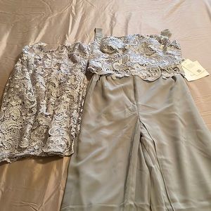 The pants are silky and the top and jacket are lace it is very well made